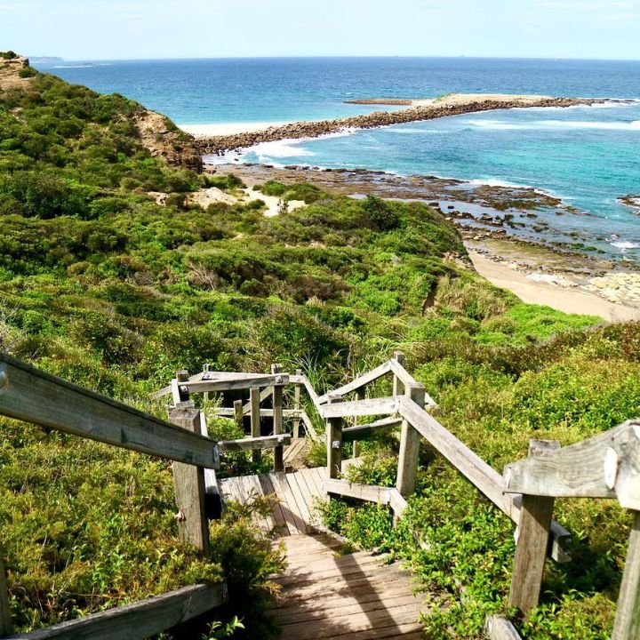 Stairs leading to a lookout over the ocean